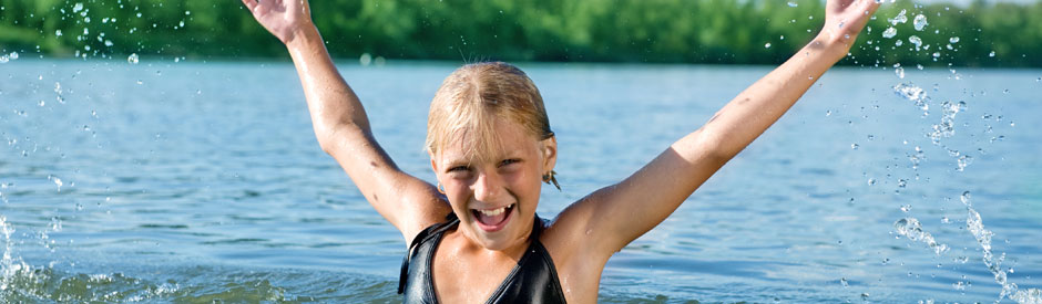 Girl swimming at Shade's Mills Park, Cambridge