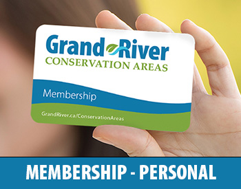 Hand holding membership card for personal use