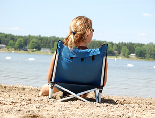 Girl on chair at beach