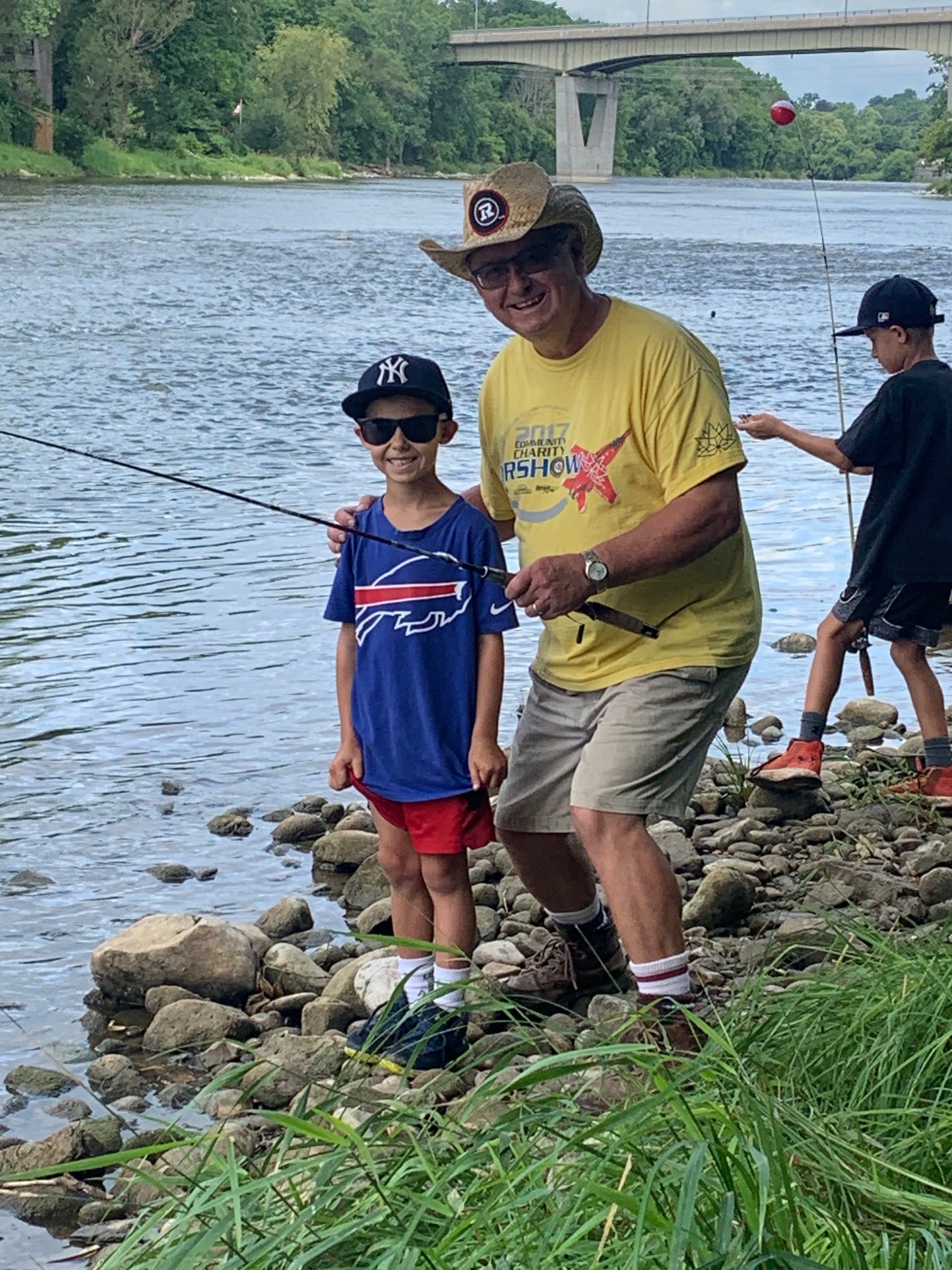 Wayne Fyffe fishing with child on Grand River