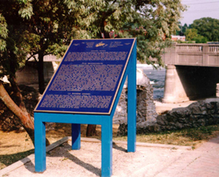A photo of the River Heritage Plaque along the Grand River located in Mill Race Park in Cambridge is shown as an example.